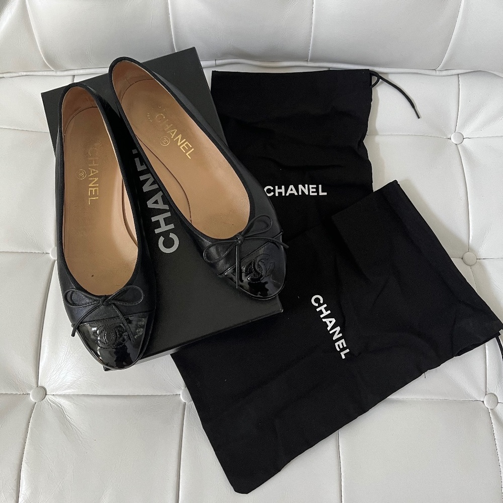 Classic Chanel ballet flats lambskin with patent toe.